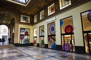 a building with stained glass windows on the wall at Albergo Garisenda in Bologna