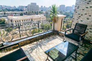 a balcony with a view of a city at Luxury VIP apartment in Cairo