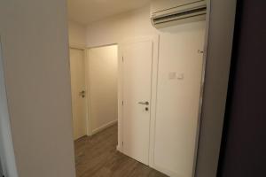 an empty room with an open door to a hallway at Apartments with WiFi Sibenik - 20831 in Šibenik