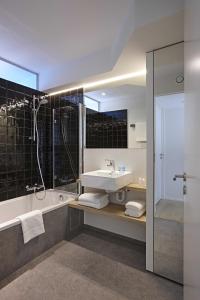 Koupelna v ubytování Kustappartementen + 13 fotografií