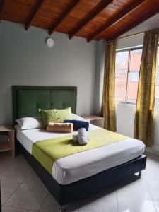 Postel nebo postele na pokoji v ubytování Hotel El Deportista