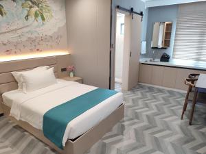 Postel nebo postele na pokoji v ubytování Fan's Hotel- Ormoc