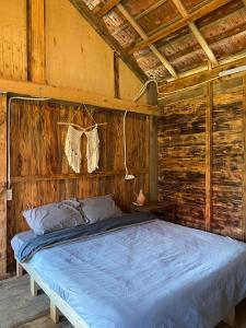 Cama o camas de una habitación en Sun Homestay Mang Den