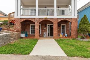 a brick house with a balcony on top of it at City Chic Private Room & Bath in Atlanta