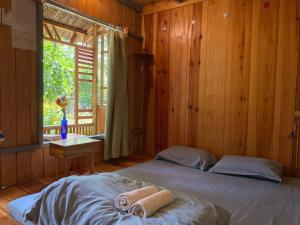 Đà Lạt Củi Homestay客房内的一张或多张床位