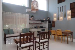 Kuchyň nebo kuchyňský kout v ubytování MUNI MUNI VILLAS SIARGAO