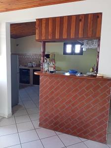 Köök või kööginurk majutusasutuses T3 Bel Enclos SCHOELCHER Kybo Karaib Location Vue mer Calme