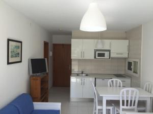 Kuchyňa alebo kuchynka v ubytovaní Apartamentos Llevant