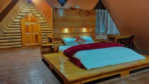 Postelja oz. postelje v sobi nastanitve Vamoose Siiro Resort