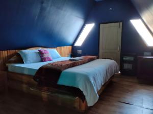 Postel nebo postele na pokoji v ubytování Vamoose Siiro Resort