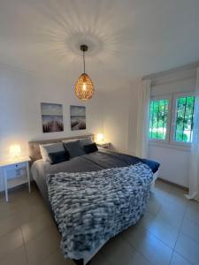 Posteľ alebo postele v izbe v ubytovaní Playa Cristo Amazing Beach Terrace Appartment