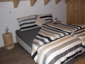 Postel nebo postele na pokoji v ubytování Apartments Resi
