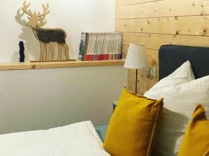Postel nebo postele na pokoji v ubytování B&B RingLodge