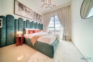Postel nebo postele na pokoji v ubytování Distinguished 2BR at Harbour Views Tower 1 by Deluxe Holiday Homes