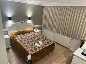 Кровать или кровати в номере Hotel Alp Guesthouse