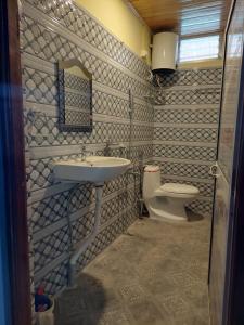 Koupelna v ubytování Athithi homestay