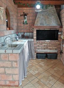 Kuchyň nebo kuchyňský kout v ubytování Finca Vistas al Teide con jacuzzi, wifi y TV satélite