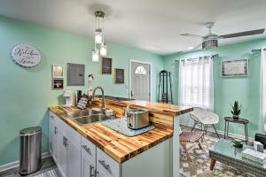 a kitchen with a sink and a counter top at Pet-Friendly Fayetteville Vacation Rental! in Fort Bragg +16 photos