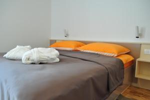 Posteľ alebo postele v izbe v ubytovaní Apartments City&style