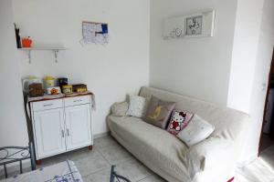 a living room with a couch and a table at Casa Mary in Lavello