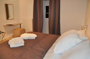 Posteľ alebo postele v izbe v ubytovaní Apartments City&style