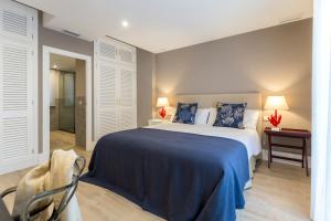 Posteľ alebo postele v izbe v ubytovaní Gran vivienda en la Rambla!