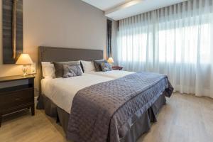 Posteľ alebo postele v izbe v ubytovaní Gran vivienda en la Rambla!