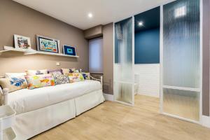 Posteľ alebo postele v izbe v ubytovaní Gran vivienda en la Rambla!