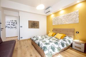 Postel nebo postele na pokoji v ubytování Casa Leonida