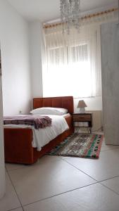 Voodi või voodid majutusasutuse Isabel Rooms toas