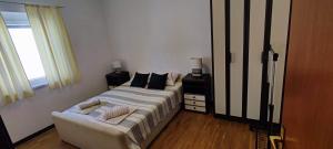 Postel nebo postele na pokoji v ubytování Apartments Berny