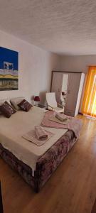 Postel nebo postele na pokoji v ubytování Apartments Berny