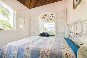 Ένα ή περισσότερα κρεβάτια σε δωμάτιο στο CasaBlanca