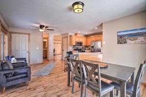 a kitchen and dining room with a table and chairs at Family-Friendly Oregon Vacation Home with Yard in Bend