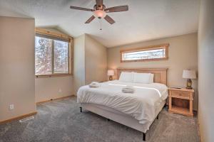 a bedroom with a bed and a ceiling fan at Family-Friendly Oregon Vacation Home with Yard in Bend