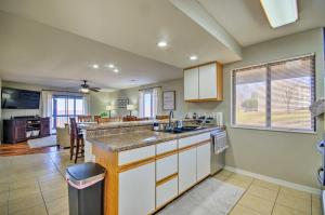 a kitchen with a sink and a counter top at Ozarks Vacation Rental Condo with Lake View! in Lake Ozark