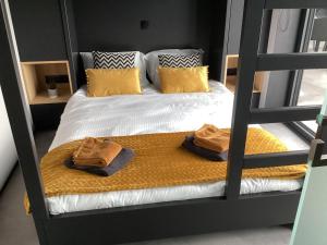 Posteľ alebo postele v izbe v ubytovaní Le Bel R