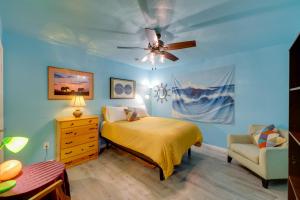 a bedroom with a bed and a ceiling fan at Payson Vacation Rental with Private Patio! in Payson