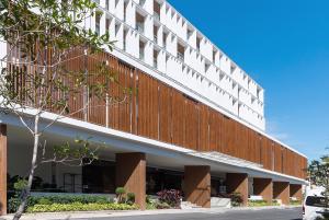 an external view of a building at Shambhala Hotel Pattaya - SHA Plus in Pattaya Central