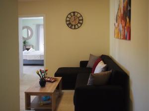 A seating area at Charming apartment in Halepa!