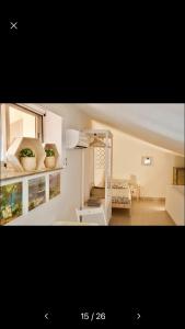 Kuchyň nebo kuchyňský kout v ubytování BeachFront Rooms Marina di Ragusa