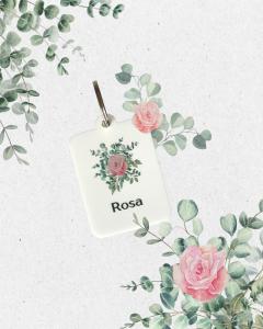a drawing of a tag with flowers on a wall at B & B Il Giardino in Noto +2 photos