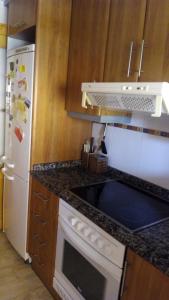 A kitchen or kitchenette at Xeraco Beach Alma