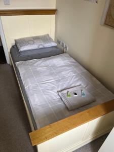 Voodi või voodid majutusasutuse Cozy Room toas
