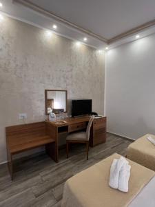 TV a/nebo společenská místnost v ubytování EKA Residence