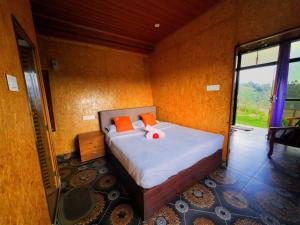 Postel nebo postele na pokoji v ubytování Hie Moksha Glamping