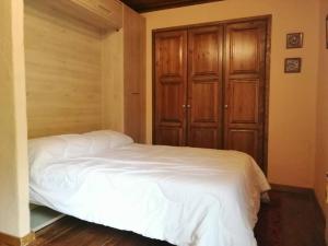 Posteľ alebo postele v izbe v ubytovaní Estudio con chimenea Cosmos 3