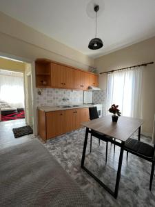 Kuchyňa alebo kuchynka v ubytovaní Greekhome Seaside Apartment