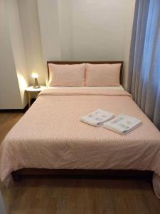Voodi või voodid majutusasutuse GLC SUITES toas