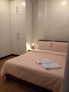 Voodi või voodid majutusasutuse GLC SUITES toas